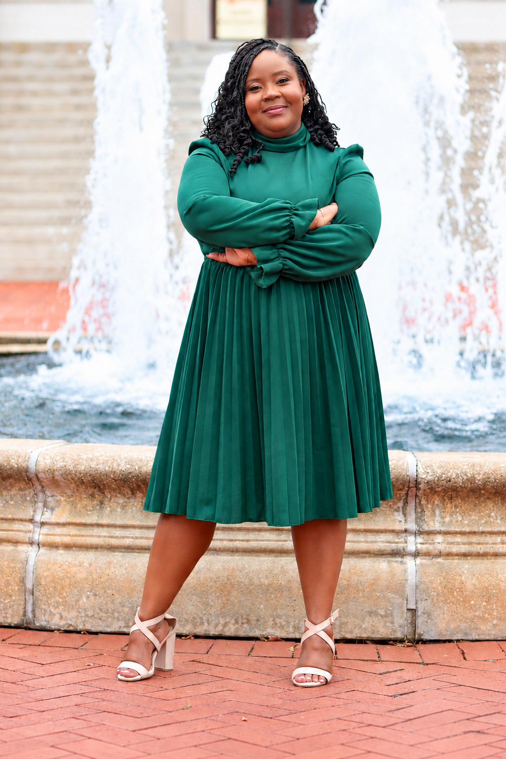 Dr. Sabrina Lee in an emerald dress