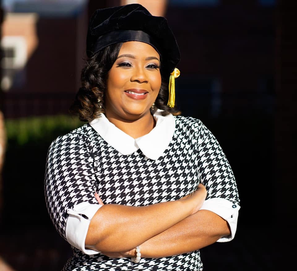 Dr. Sabrina Lee in doctoral regalia